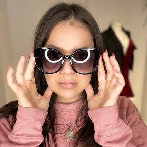 Black round frame sunglasses with gold hardware